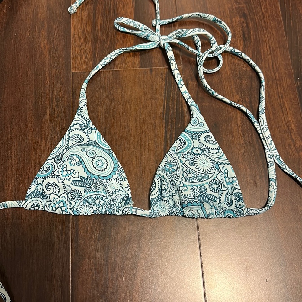 Shein turquoise design bikini top, size XS, good condition.